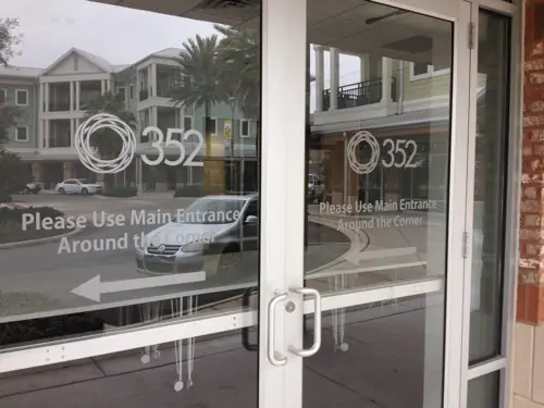 Frosted privacy film with a custom pattern applied to office glass