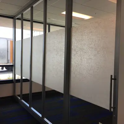 Frosted privacy film with a custom pattern applied to office glass (example 4)