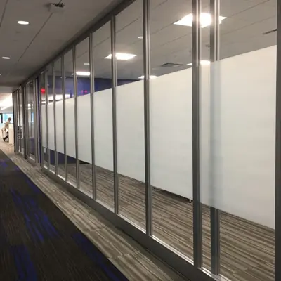 Frosted privacy film with a custom pattern applied to office glass (example 6)