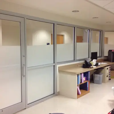 Frosted privacy film with a custom pattern applied to office glass (example 9)