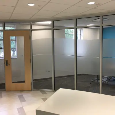 Frosted privacy film with a custom pattern applied to office glass (example 10)