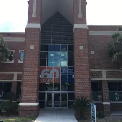 Perforated one-way window graphic applied to storefront glass (example 10)