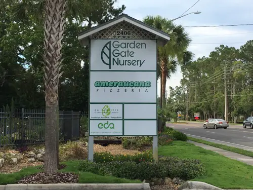Post and panel business sign built and installed by Cardinal Signs