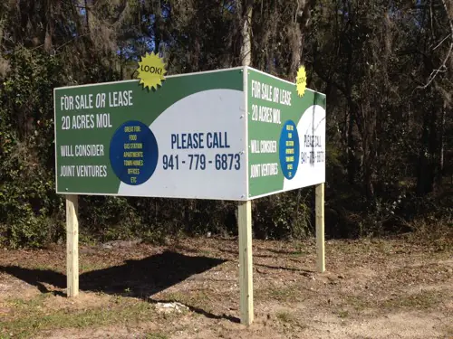 Post and panel business sign built and installed by Cardinal Signs (example 11)