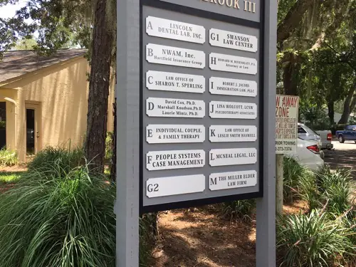 Sandblasted dimensional sign with raised lettering made by Cardinal Signs