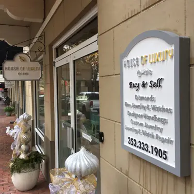 Sandblasted dimensional sign with raised lettering made by Cardinal Signs (example 2)