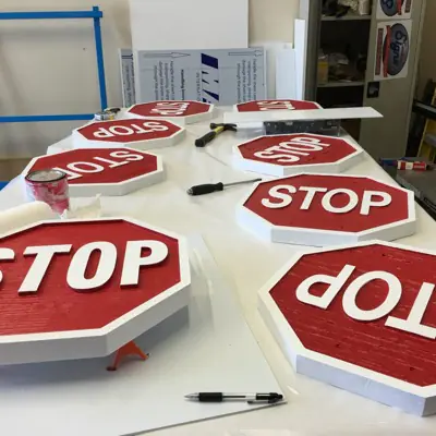 Sandblasted dimensional sign with raised lettering made by Cardinal Signs (example 3)