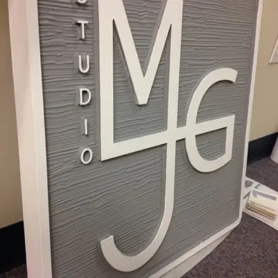 Sandblasted dimensional sign with raised lettering made by Cardinal Signs (example 10)